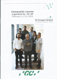 A group of young dentists and one not so young one in the middle, all enjoying the training facilitieS of GC Europe